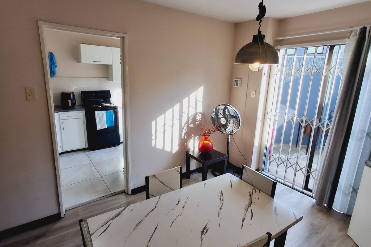 “Spacious 2-bedroom townhouse conveniently located near the Sasolburg CBD and major amenities.” - Photo 3