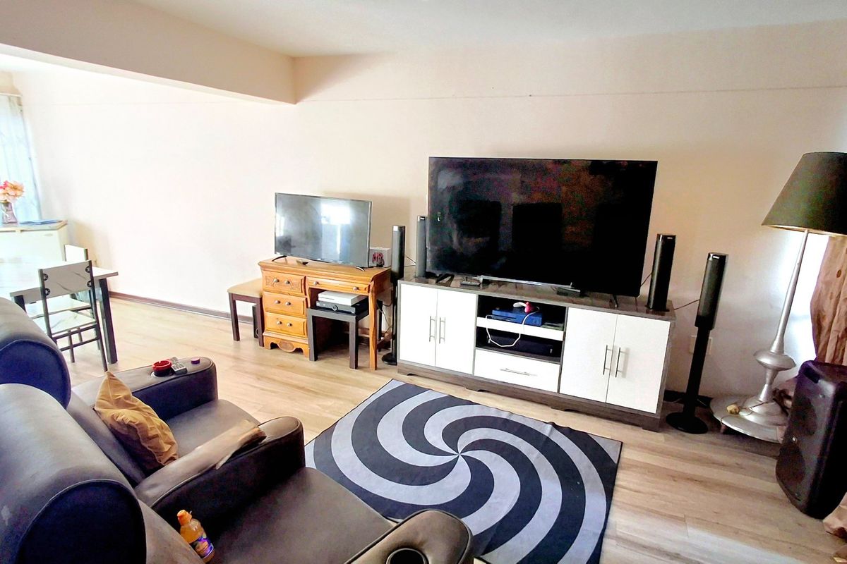 “Spacious 2-bedroom townhouse conveniently located near the Sasolburg CBD and major amenities.” - Photo 2