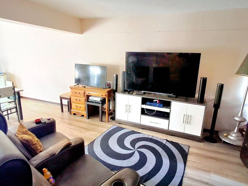 “Spacious 2-bedroom townhouse conveniently located near the Sasolburg CBD and major amenities.” - Photo 2