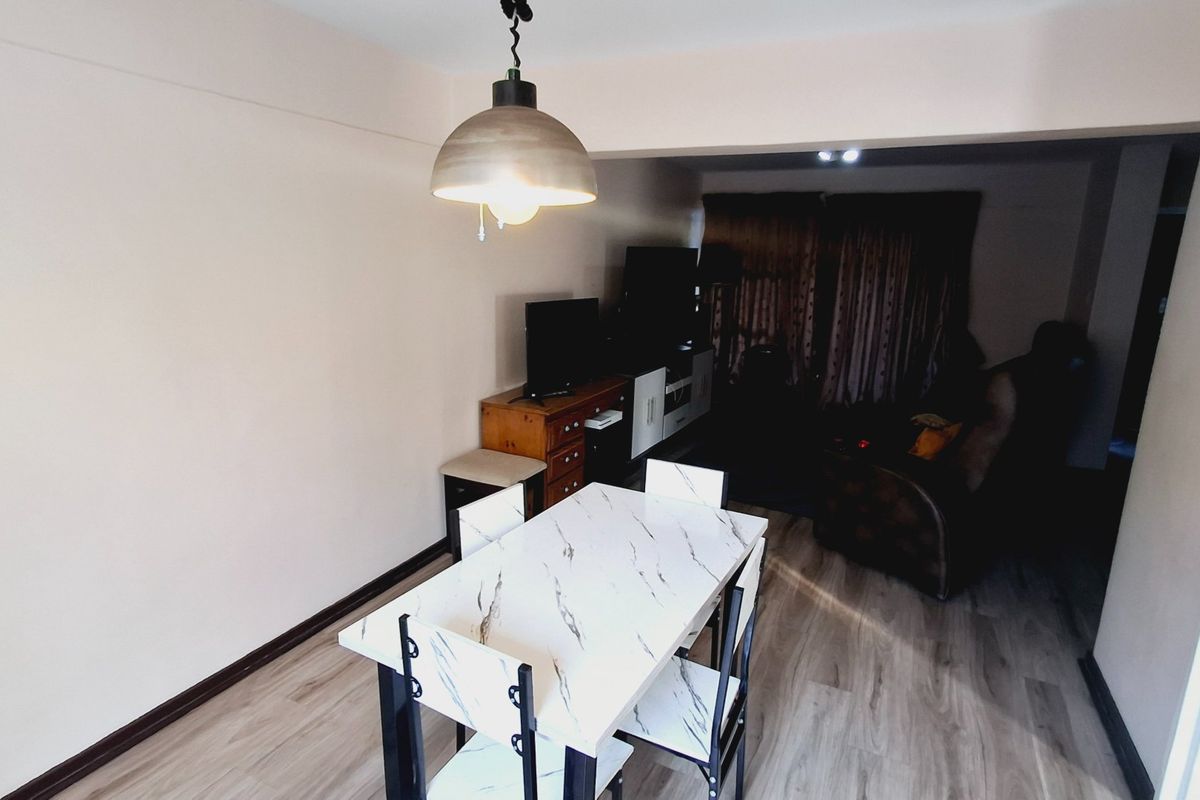 “Spacious 2-bedroom townhouse conveniently located near the Sasolburg CBD and major amenities.” - Photo 5