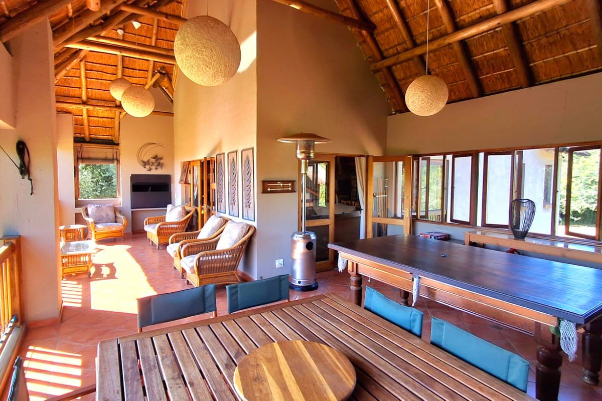 "Stunning 4-bedroom family home, priced to sell, located in the highly sought-after Boschenvaal Riverfront Lodge." - Photo 4