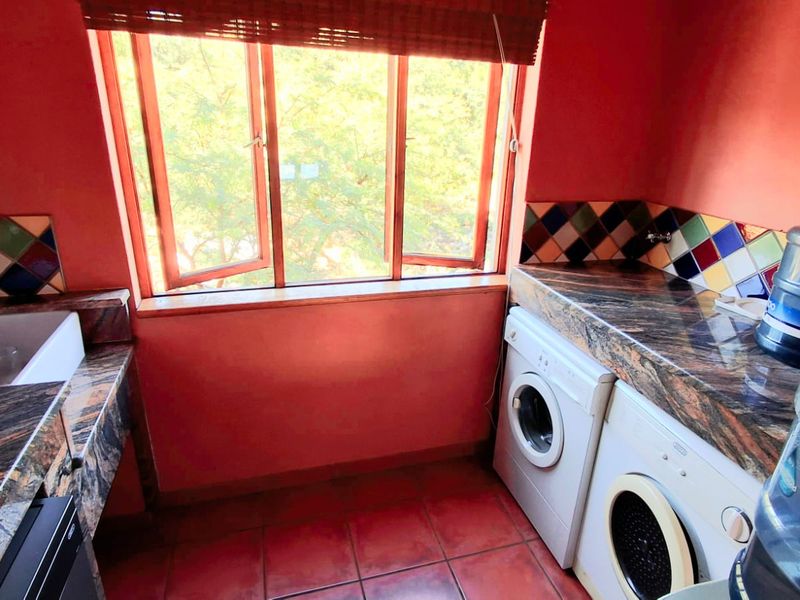 "Stunning 4-bedroom family home, priced to sell, located in the highly sought-after Boschenvaal Riverfront Lodge." - Photo 9