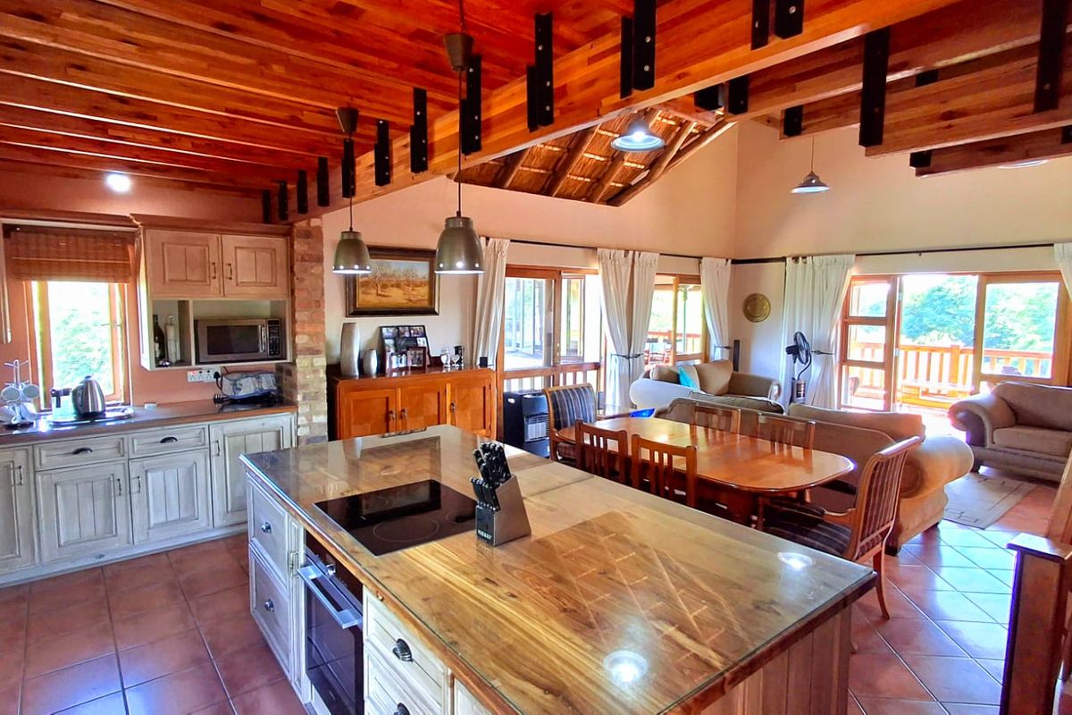 "Stunning 4-bedroom family home, priced to sell, located in the highly sought-after Boschenvaal Riverfront Lodge." - Photo 3