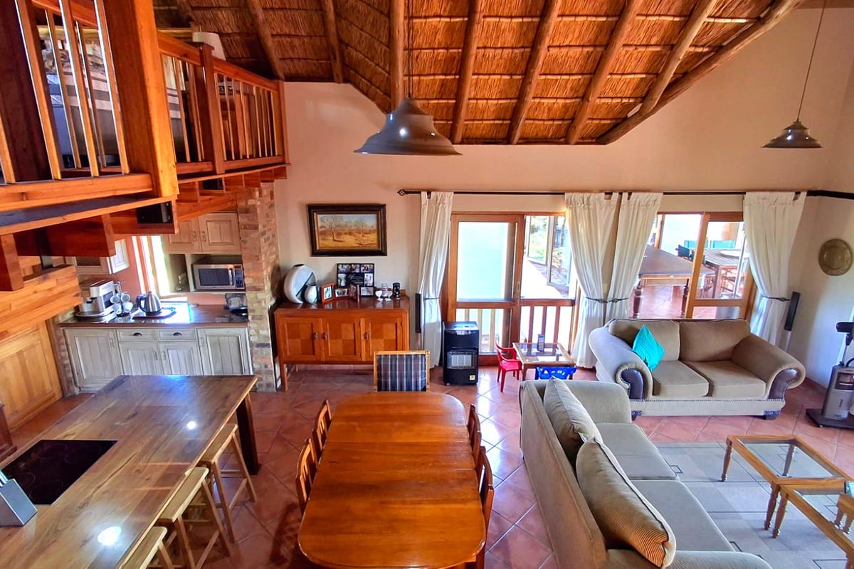"Stunning 4-bedroom family home, priced to sell, located in the highly sought-after Boschenvaal Riverfront Lodge." - Photo 5