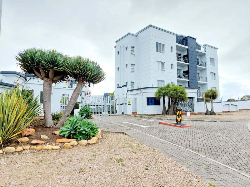 Exclusive Ground-Floor Coastal Apartment | Secure Lifestyle | A real Investment - Photo 2