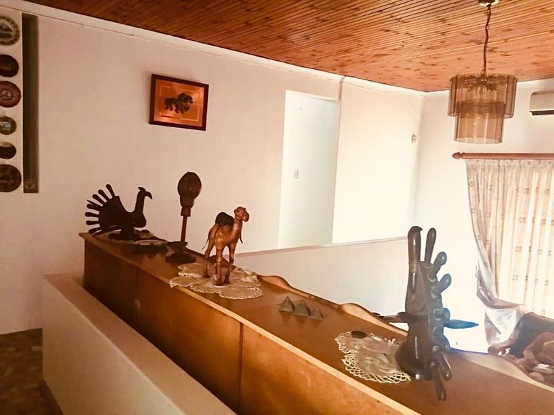 Spacious 6-Bedroom Home with Multiple Living Areas, Ample Parking and Income Potential in Reservoir Hills - Photo 8