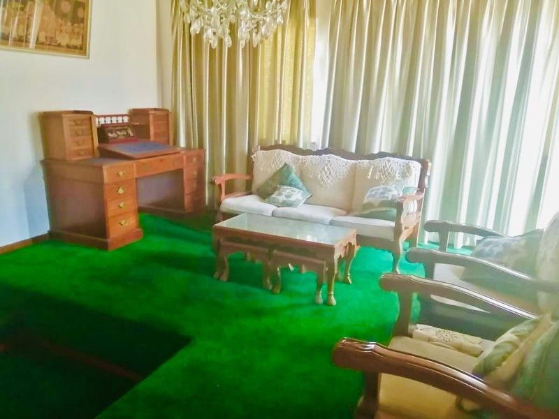 Spacious 6-Bedroom Home with Multiple Living Areas, Ample Parking and Income Potential in Reservoir Hills - Photo 7