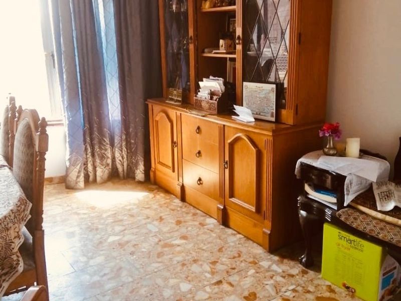 Spacious 6-Bedroom Home with Multiple Living Areas, Ample Parking and Income Potential in Reservoir Hills - Photo 6