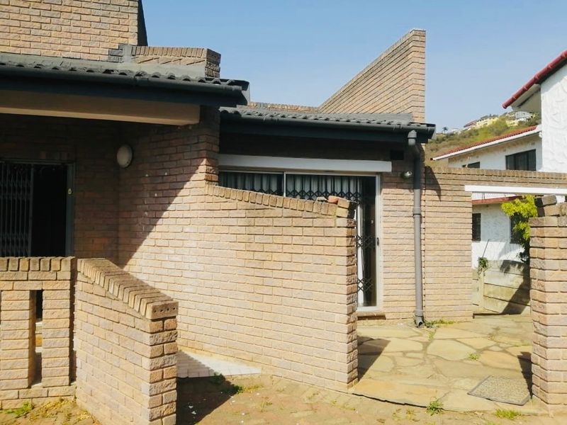 Spacious 6-Bedroom Home with Multiple Living Areas, Ample Parking and Income Potential in Reservoir Hills - Photo 1