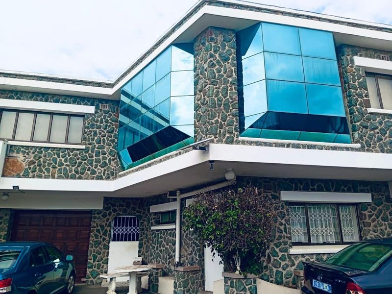 5-Bedroom Double-Storey Home with Dual Kitchens, 6-Car Garage, and Multi-Generational Living Potential  - Photo 1