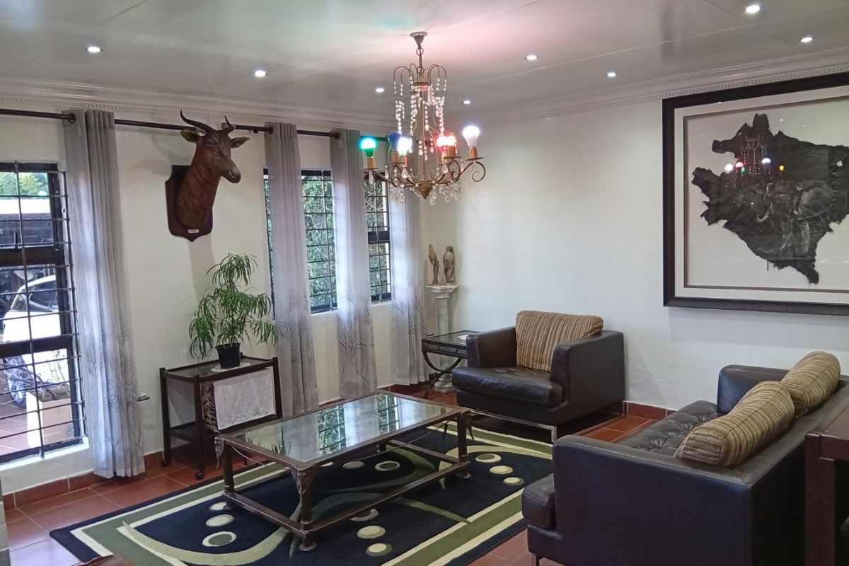 Exceptional Investment Property with Two Income-Generating Cottages in Orange Grove - Photo 5