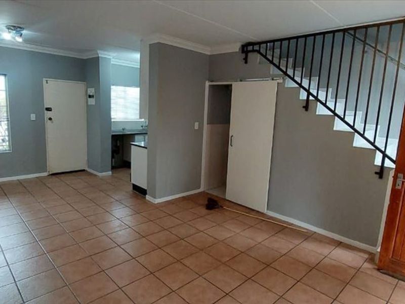 Charming Two-Bedroom Home with Practical Living Spaces - Photo 3