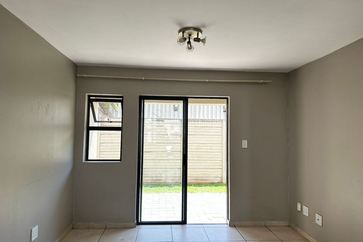 Neat & Secure  2-Bedroom Unit - Photo 5