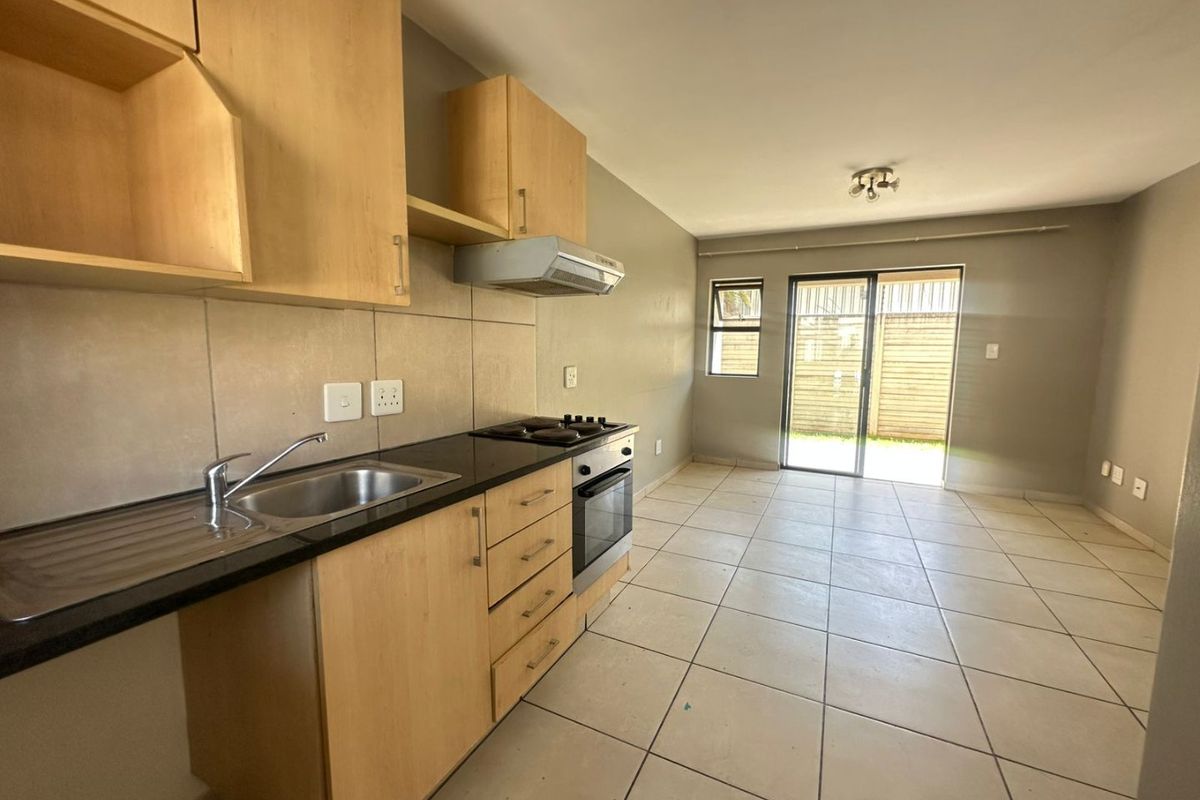 Neat & Secure  2-Bedroom Unit - Photo 2