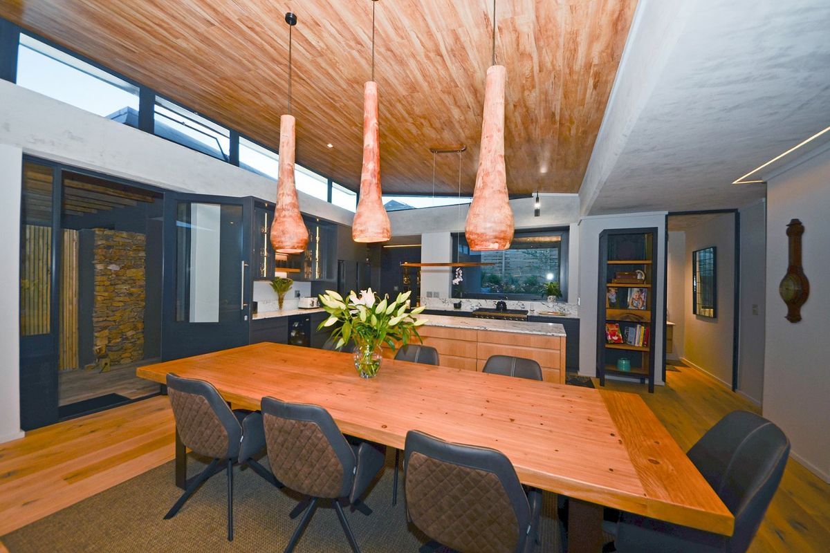 New Innovative Home Nurtured in Natural Stone and Wood - Photo 5