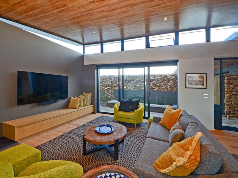 New Innovative Home Nurtured in Natural Stone and Wood - Photo 4