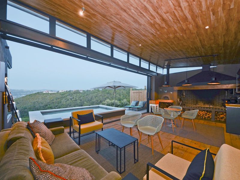 New Innovative Home Nurtured in Natural Stone and Wood - Photo 10