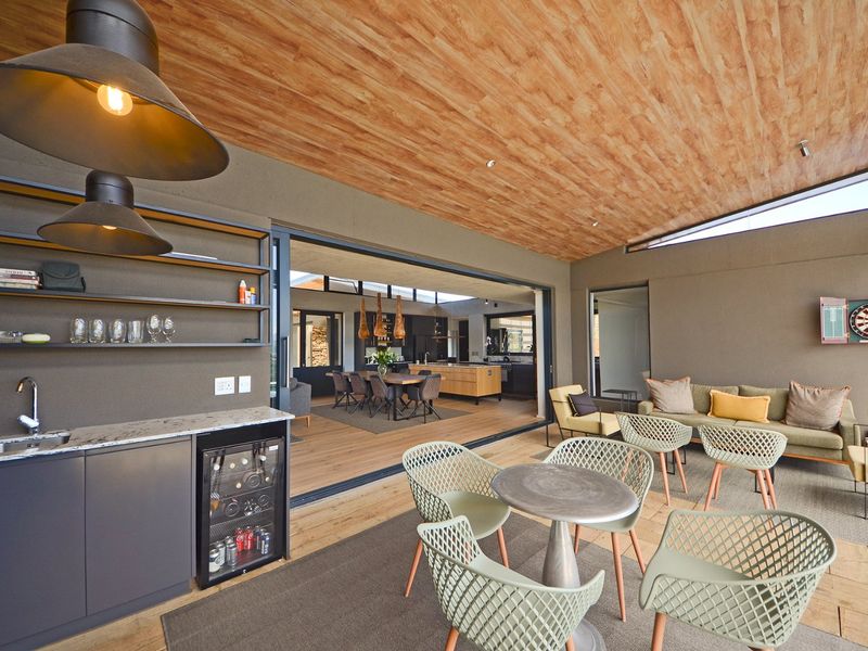 New Innovative Home Nurtured in Natural Stone and Wood - Photo 9