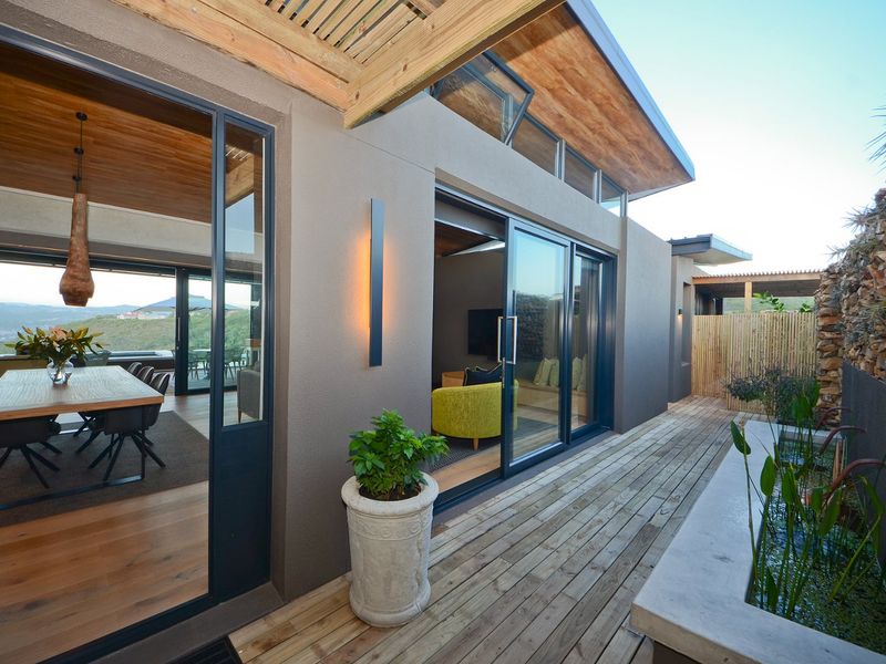 New Innovative Home Nurtured in Natural Stone and Wood - Photo 3