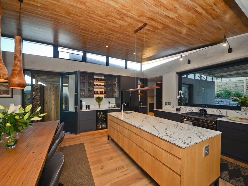 New Innovative Home Nurtured in Natural Stone and Wood - Photo 7