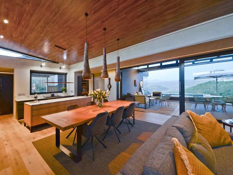 New Innovative Home Nurtured in Natural Stone and Wood - Photo 6