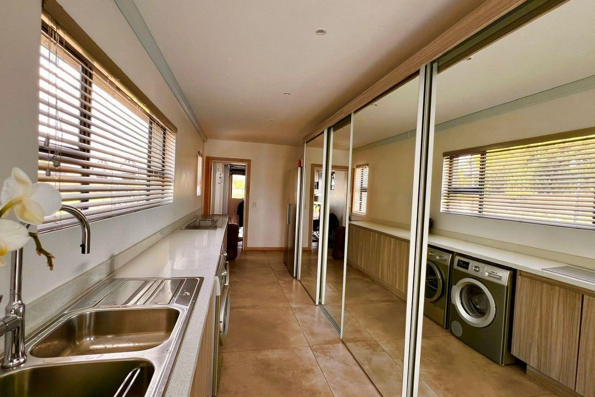 Front-Row Golf Course Living With River Views — Scandinavian- Contempary Luxury Home in Heron Banks - Photo 3