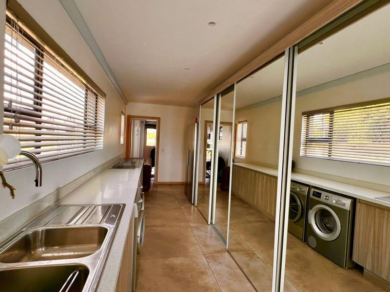 Front-Row Golf Course Living With River Views — Scandinavian- Contempary Luxury Home in Heron Banks - Photo 3