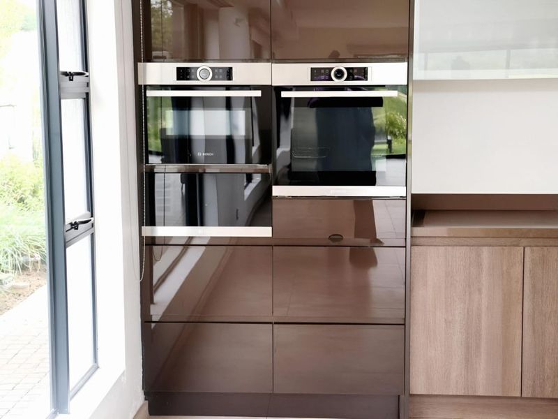 Front-Row Golf Course Living With River Views — Scandinavian- Contempary Luxury Home in Heron Banks - Photo 10