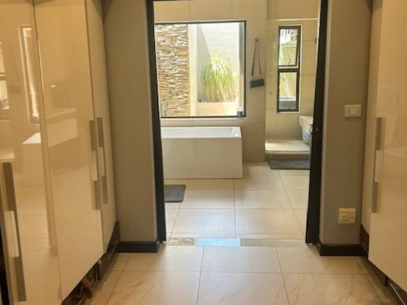 Spacious 5-Bedroom Family Home with Solar Power in Secure Estate - Photo 9