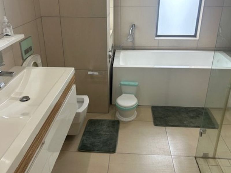 Spacious 5-Bedroom Family Home with Solar Power in Secure Estate - Photo 8