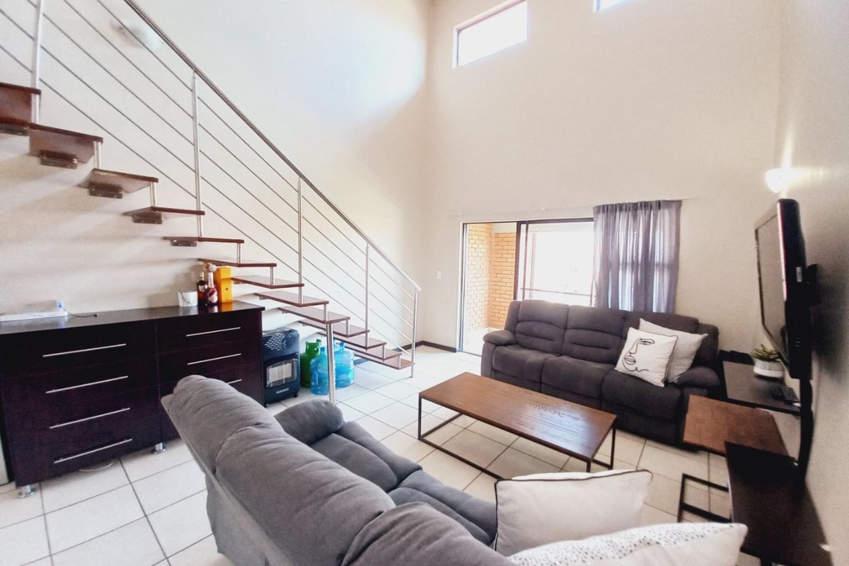 Immaculate Modern 3-Bedroom Loft Apartment Offering Space, Style, and Secure Estate Living - Photo 5