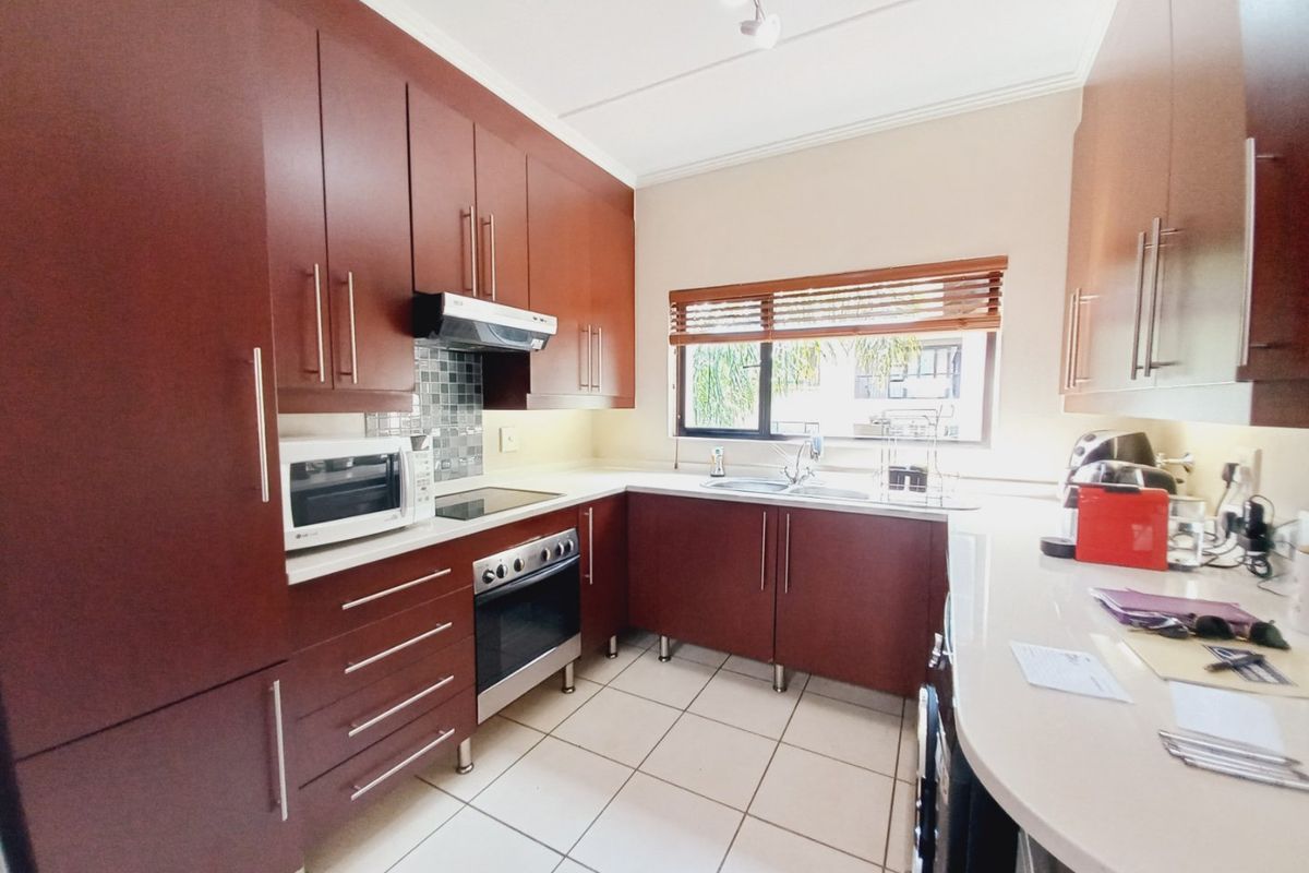 Immaculate Modern 3-Bedroom Loft Apartment Offering Space, Style, and Secure Estate Living - Photo 2