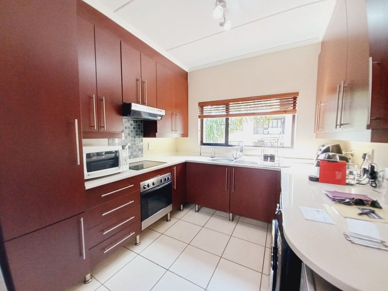 Immaculate Modern 3-Bedroom Loft Apartment Offering Space, Style, and Secure Estate Living - Photo 2