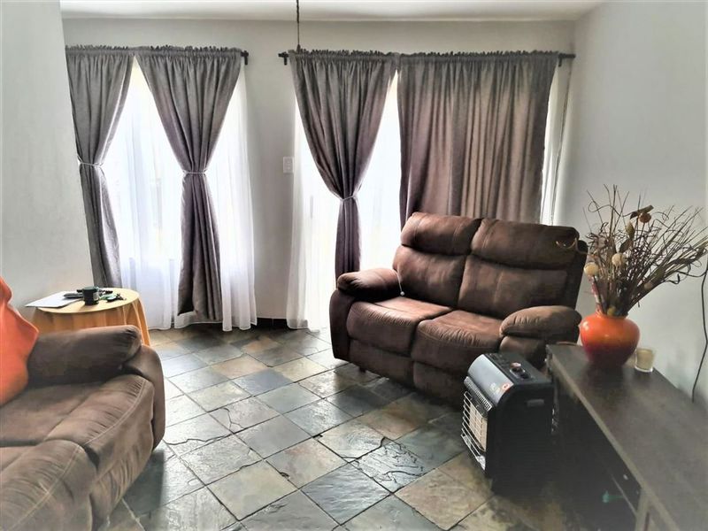 Cozy and Well-Located Two-Bedroom Home - Photo 2