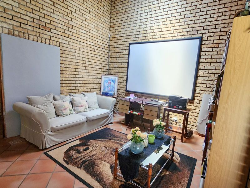 Spacious four bedroom family home with three bathrooms, a study, double garage, and a swimming pool, offering comfortable and practical living. - Photo 4