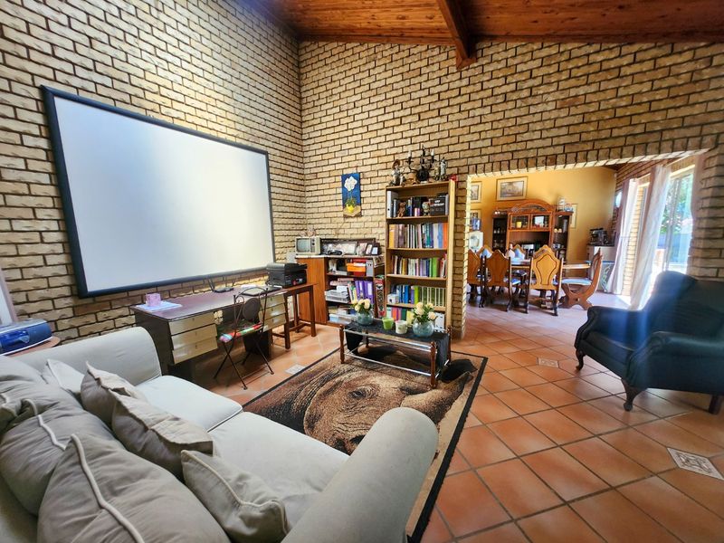 Spacious four bedroom family home with three bathrooms, a study, double garage, and a swimming pool, offering comfortable and practical living. - Photo 6