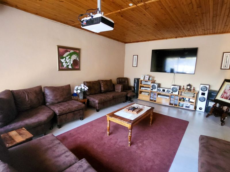 Spacious four bedroom family home with three bathrooms, a study, double garage, and a swimming pool, offering comfortable and practical living. - Photo 3