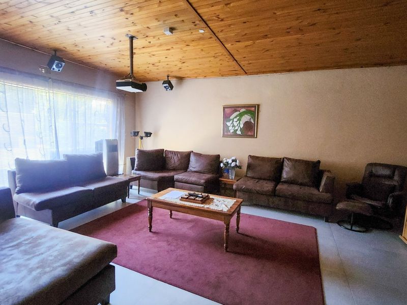 Spacious four bedroom family home with three bathrooms, a study, double garage, and a swimming pool, offering comfortable and practical living. - Photo 2