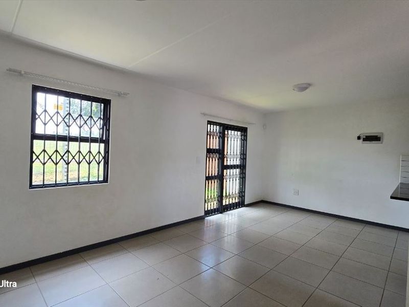 Cozy Two-Bedroom Home with Modern Comforts - Photo 2