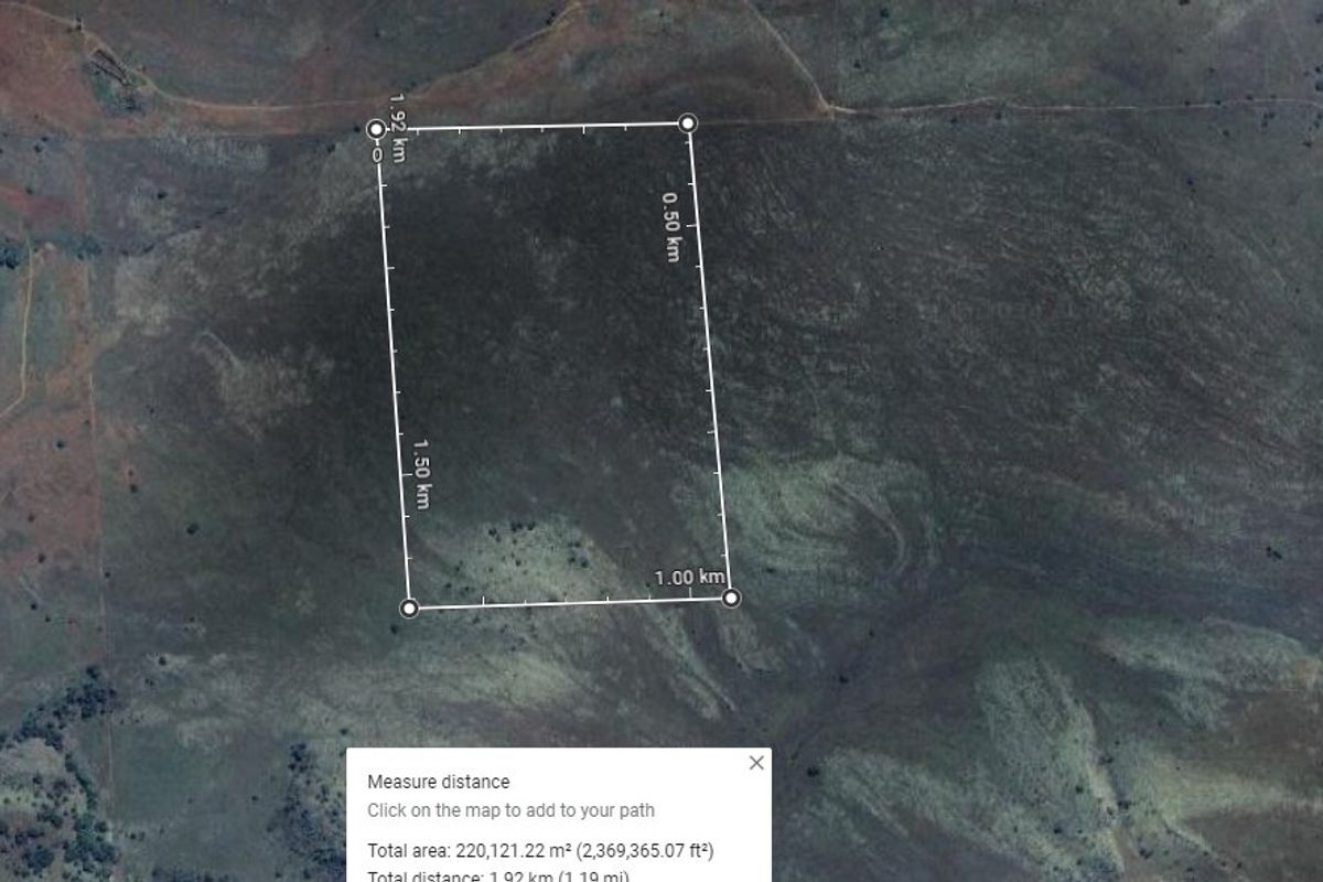 An aerial satellite view showing the land boundaries and dimensions of the farm property.