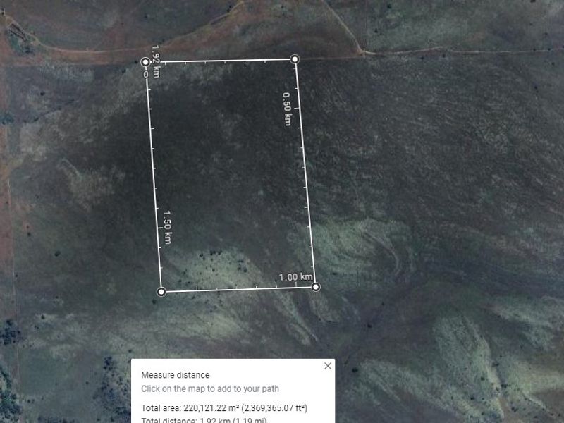 An aerial satellite view showing the land boundaries and dimensions of the farm property.