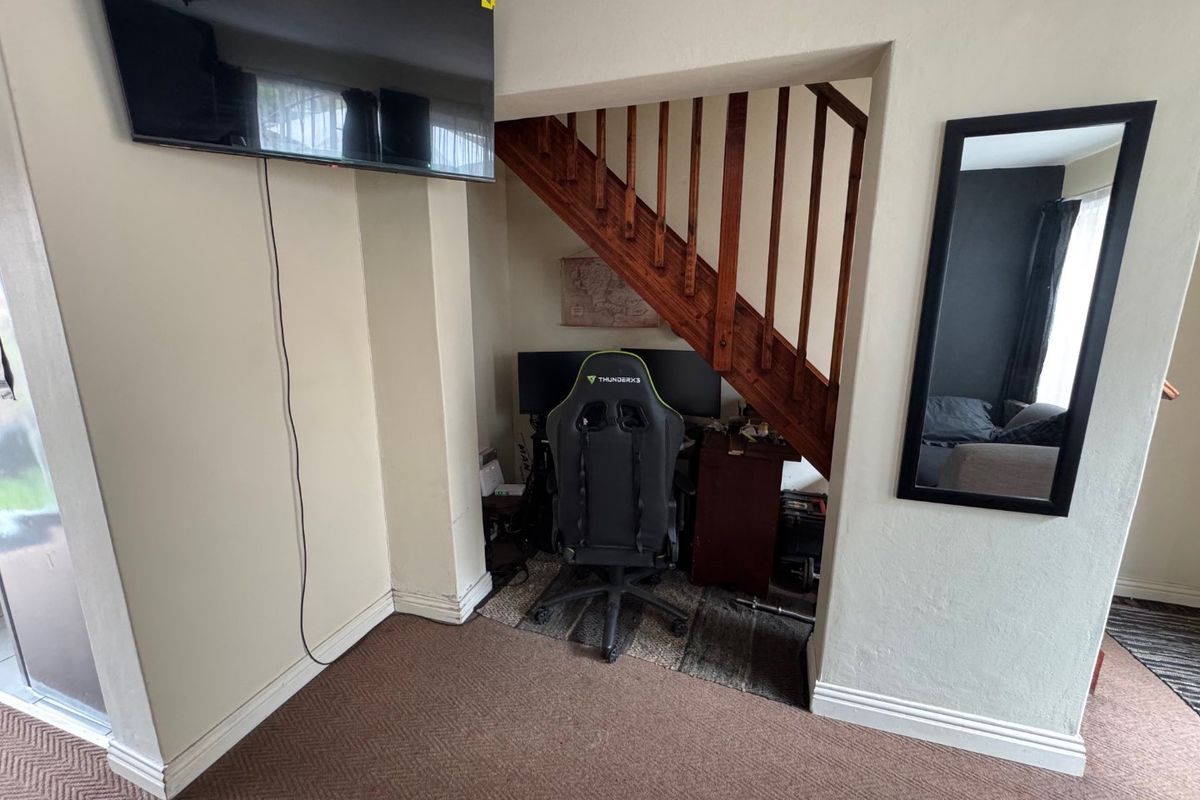 Comfortable Two-Bedroom Home with Practical Living Spaces - Photo 3