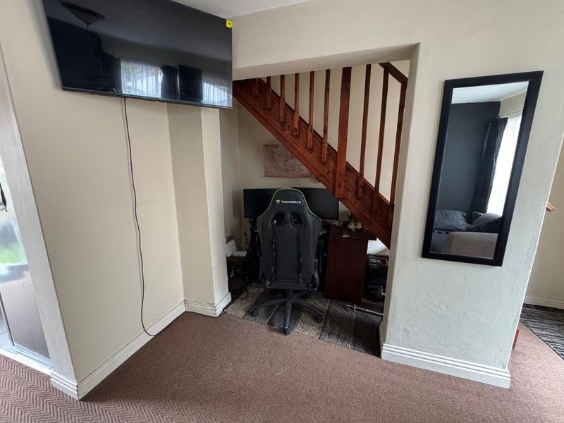 Comfortable Two-Bedroom Home with Practical Living Spaces - Photo 3