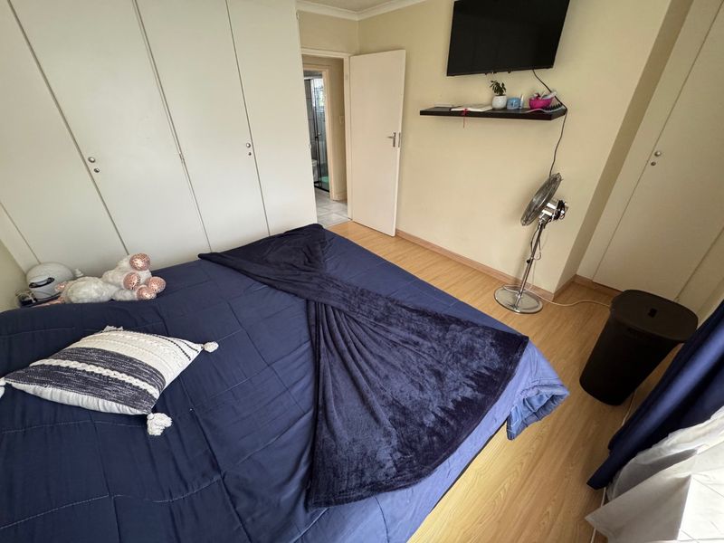 Comfortable Two-Bedroom Home with Practical Living Spaces - Photo 10