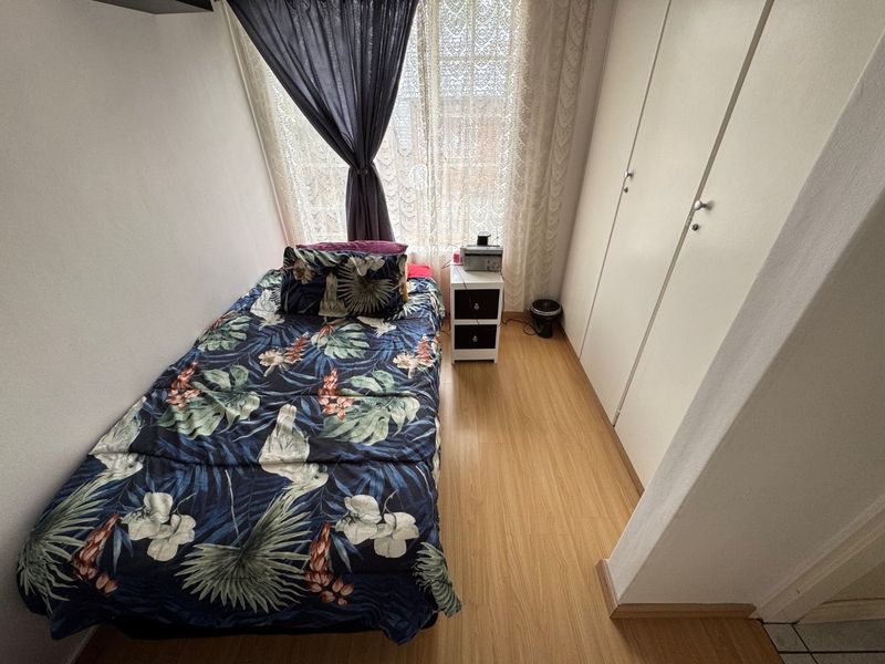 Comfortable Two-Bedroom Home with Practical Living Spaces - Photo 8