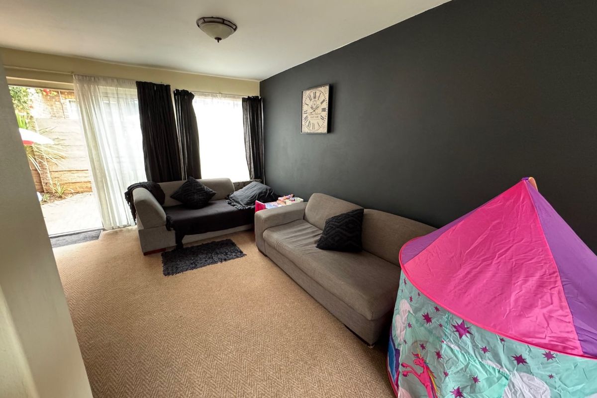 Comfortable Two-Bedroom Home with Practical Living Spaces - Photo 4