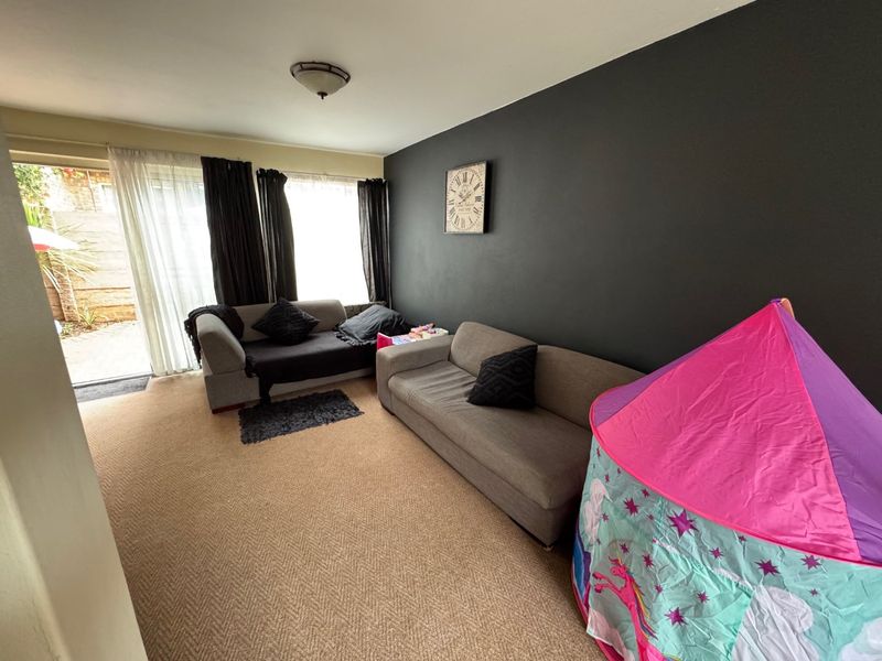 Comfortable Two-Bedroom Home with Practical Living Spaces - Photo 4