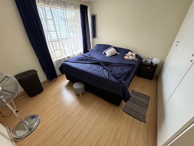 Comfortable Two-Bedroom Home with Practical Living Spaces - Photo 9