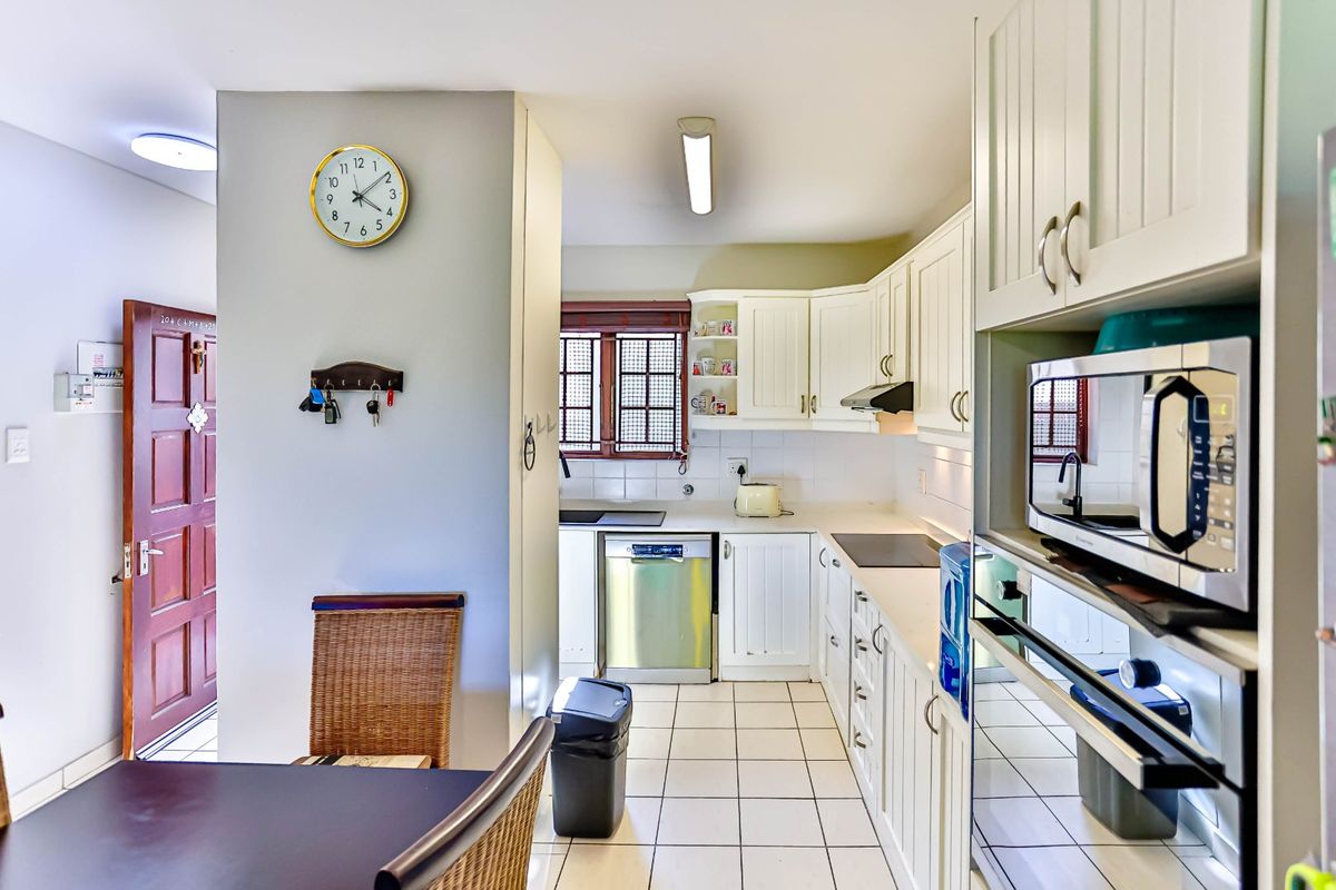 Practical Estate Living with Space and Security - Photo 3