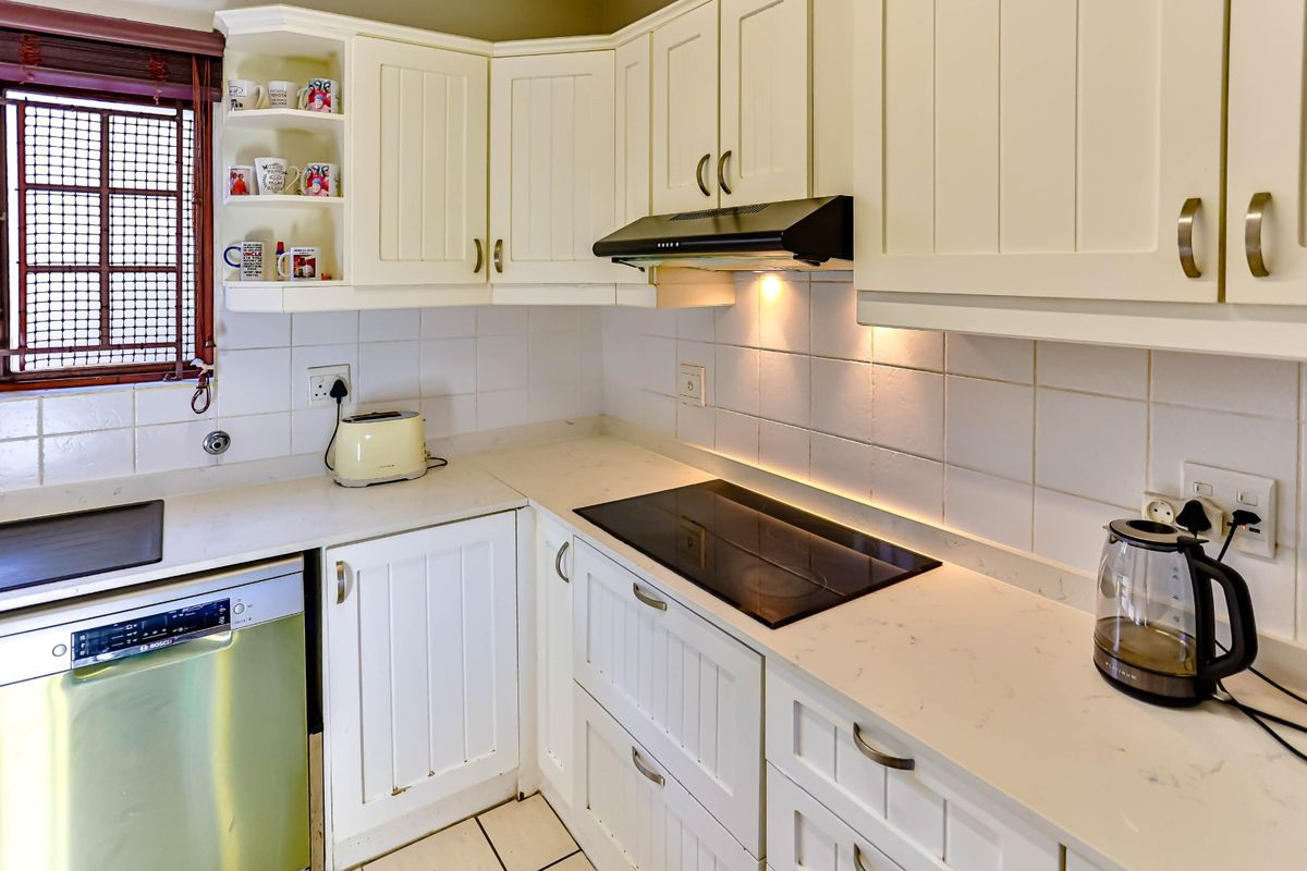 Practical Estate Living with Space and Security - Photo 2